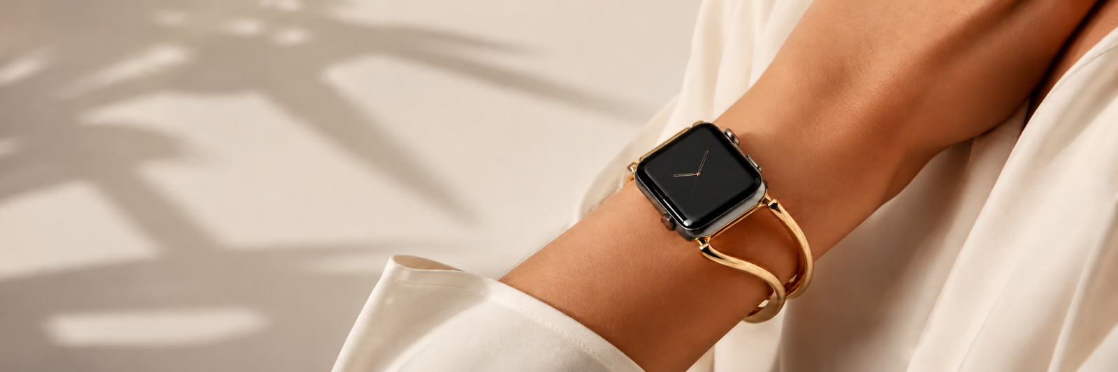 Elegant smartwatch with sculptural gold bracelet