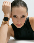 Per Diem Model wearing the Knotted Cuff in 18K gold plated