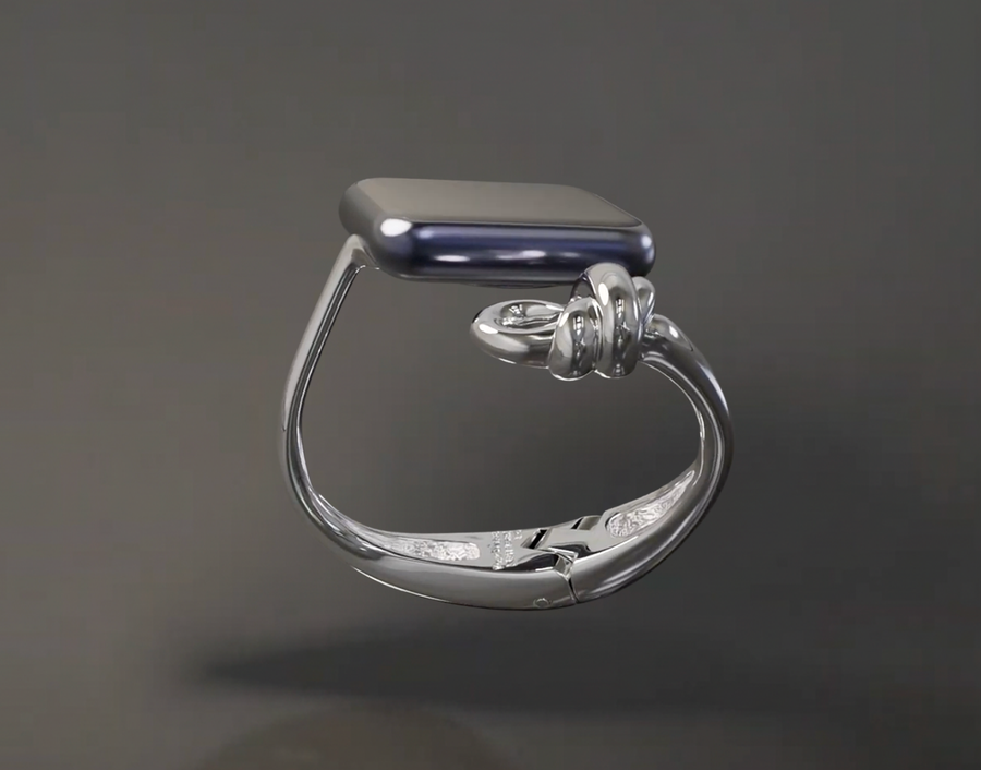 Silver ring with a blue gemstone on a dark gray background